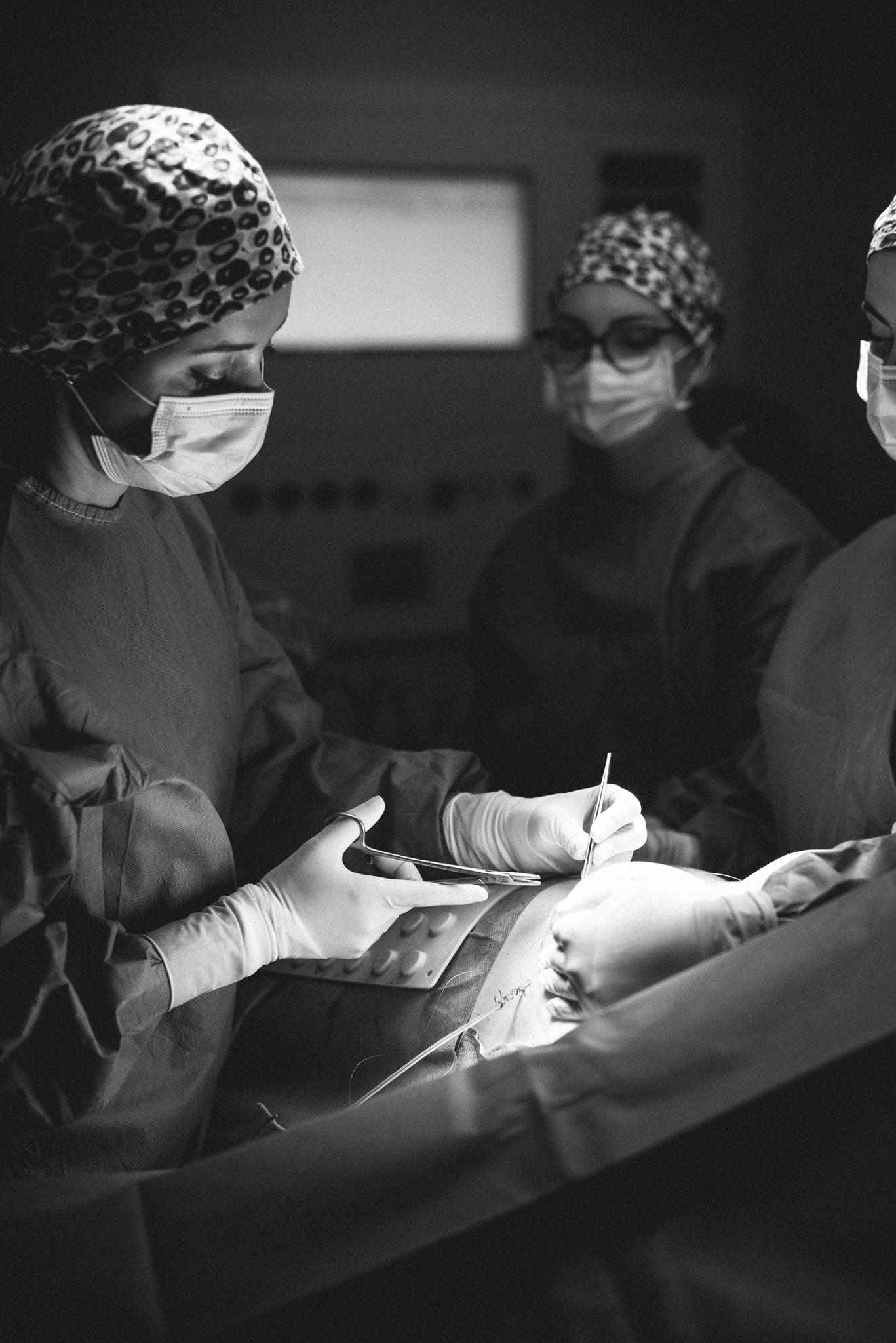 Black and white photo of heart rate monitor during plastic surgery. Photography by Laura Divella